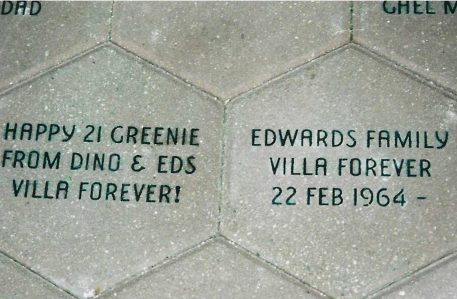 Two hexagonal paving stones at Villa Park. One reads 'EDWARDS FAMILY, VILLA FOREVER, 22 FEB 1964'; the one beside it reads 'HAPPY 21 GREENIE FROM DINO & EDS, VILLA FOREVER!'